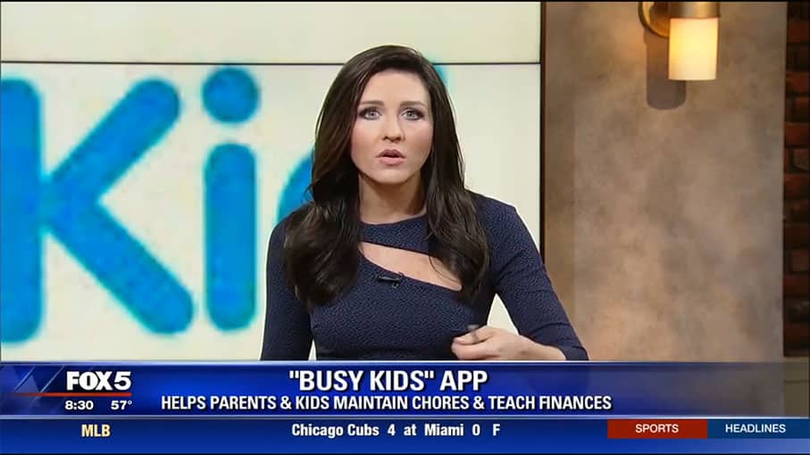 A woman on Fox 5 TV discussing the Busy Kids app.