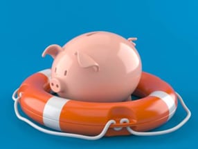 A piggy bank on a life preserver floating on a blue background.