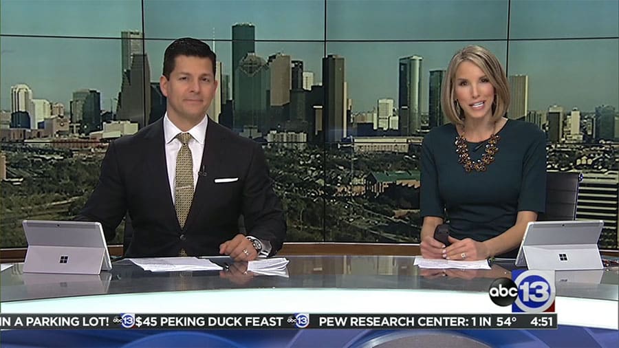 A man and woman sitting at a news desk in Houston, TX for KTRK.