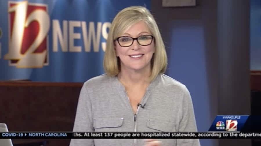 A woman in glasses is talking on the news in Louisville.
